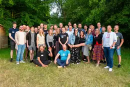 The +Pluswerk team at Pluscamp 2023 in the natural surroundings of the Knüllgebirge mountains