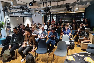 Participants at the first TYPO3 Camp UK in London Participants at the first TYPO3 Camp UK in London sit in the MSQ event room in Covent Garden and wait for the next presentation.